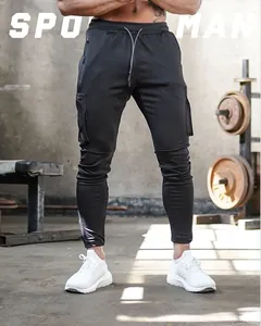 Detail view of men's slim fit black cargo joggers for gym and fitness training