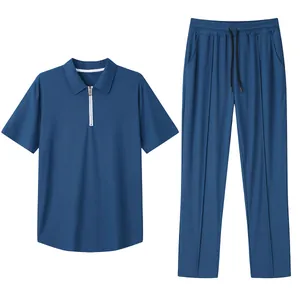 Detail view of a blue 2-piece men's casual set featuring a piqué polo shirt and trousers