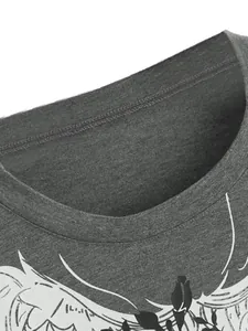 Detailed macro view of gray crew neck t-shirt collar fabric and white graphic print