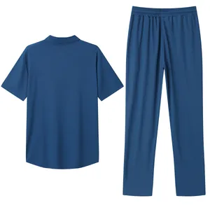 Back view detail of blue men's 2-piece casual set with short-sleeve Polo shirt and long pants