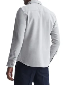 Rear view detail of a light grey men's casual shirt jacket showing premium fabric texture