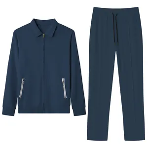 Men's navy blue casual 2-piece set with jacquard texture, zip jacket, and trousers.