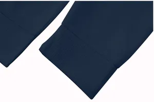 Close-up of navy blue jacquard lattice texture on men's casual jacket sleeve cuffs.