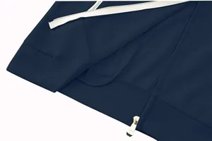 Detailed macro view of navy blue jacquard lattice jacket with white zipper and metallic puller