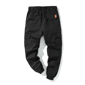 Detailed back view of black cotton cargo joggers featuring multiple pockets and elastic cuffs