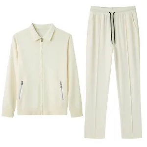 Detailed view of off-white waffle knit men's casual jacket and drawstring trousers set