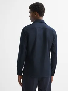 Back view of men's dark blue casual shirt jacket with thick comfortable texture