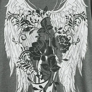 Close-up of angel wings and rose graphic print on a gray hip-hop style T-shirt