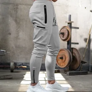 Professional men's light gray slim-fit fitness joggers with multiple functional zipper pockets