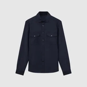 Casual navy blue men's shirt jacket with double chest pockets and stretch fabric.