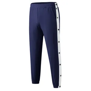 Marineblauwe heren sportbroek met drukknopen aan de zijkant en witte contrasterende strepen