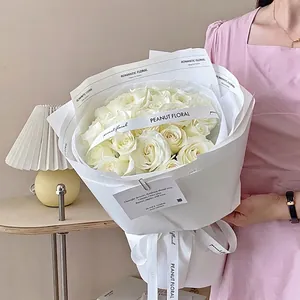 Premium white gift wrapping paper for bouquets with minimalist romantic English text