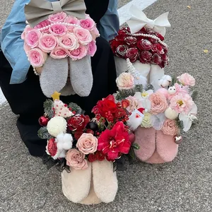 Plush rabbit ear flower hug buckets with elegant rose arrangements