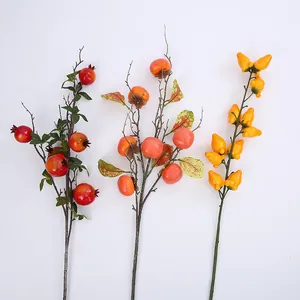 Set de 3 ramas de frutas artificiales con granada, caqui y frutos amarillos dorados