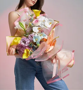 Close-up detail of waterproof transparent OPP flower wrapping paper with elegant pink borders