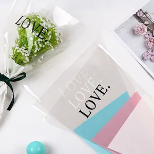 Transparent OPP flower wrapping bags featuring stylish LOVE print for floral arrangements