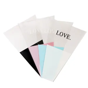 Transparent flower bouquet sleeves with LOVE print in black pink blue and white colors