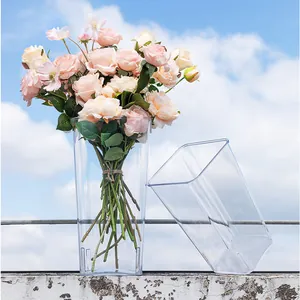 Detailed view of clear acrylic flower bucket showing transparency and square shape