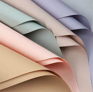 Macro view of multi-colored waterproof pastel flower wrapping paper with soft textures