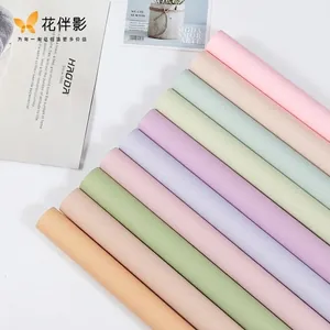 Waterproof solid color Korean style floral wrapping paper rolls in various pastel tones