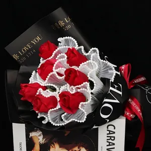 Romantic red rose bouquet elegantly wrapped in Korean style pearl wavy mesh and black paper