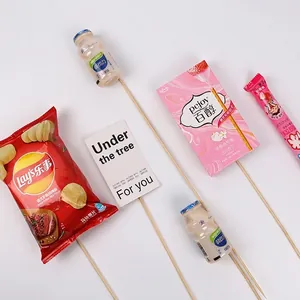 Long natural bamboo skewers for DIY snack flower bouquets and gift wrapping materials.