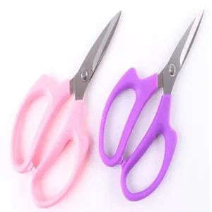 Pair of sharp floral scissors with pink and purple ergonomic plastic handles for gardening