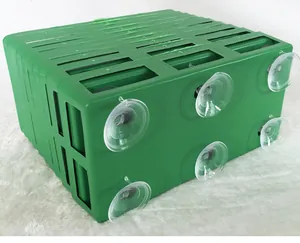 Bottom view of green rectangular floral foam tray with six suction cups