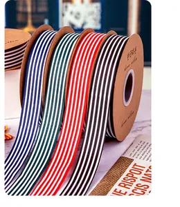 Close-up of colorful striped grosgrain ribbons for flower and gift packaging DIY crafts.