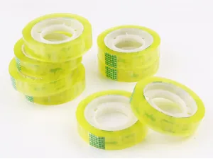 Multiple rolls of clear floral adhesive tape with green pattern on white background