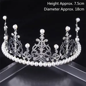 Detail view of elegant silver bridal tiara with pearls and crystals, height 7.5cm