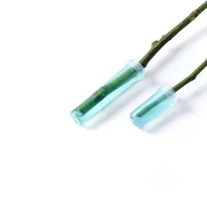 Clear floral water tubes with blue liquid for flower bouquet freshness and nutrition