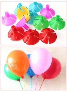 Close-up view of colorful plastic balloon sticks and cup holders for party decor