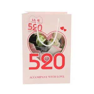 Pink Valentine's Day gift bag with heart-shaped transparent window and 520 print
