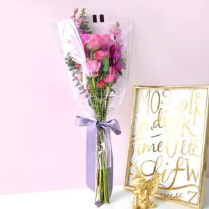 Elegant rose bouquet packaging bag with Love Rules print for Valentine's Day gifts
