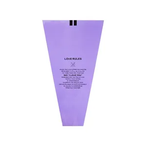 Purple trapezoidal flower bouquet packaging bag featuring Love Rules romantic print design
