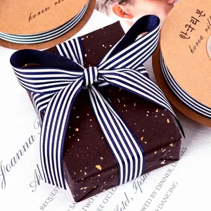 Navy blue and white striped grosgrain ribbon for gift wrapping and floral decoration