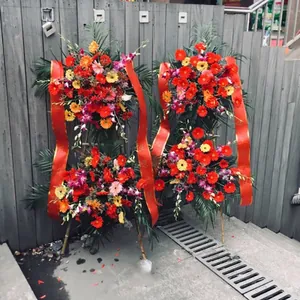 Vibrant red grand opening flower basket banners with gold edges for ceremonies