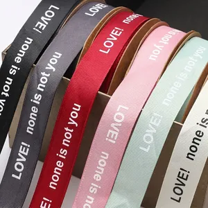 Assorted color grosgrain ribbons with LOVE text for flower bouquet packaging.