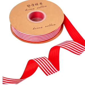 Red and white striped grosgrain ribbon for DIY floral gift packaging and baking decor.