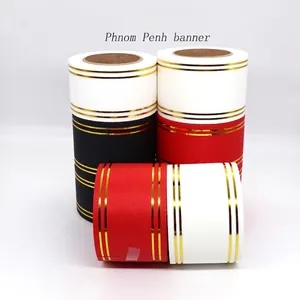 Premium gold-edged decorative ribbon rolls for floral arrangements and festive events