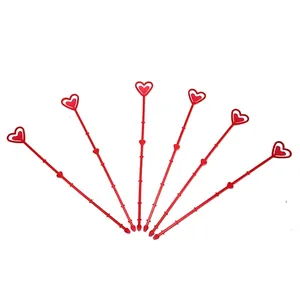 Red heart-shaped plastic floral card holder picks for flower bouquet arrangements.