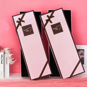 Elegant pink rectangular flower gift box with brown ribbon for romantic gifts