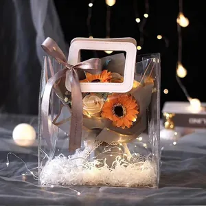 Sacchetto regalo in PVC trasparente con manici per bouquet e confezioni regalo.