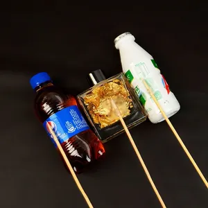 DIY snack bouquet fixing adhesive stickers with bamboo sticks for floral arrangements