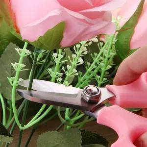 Ergonomic pink multi-purpose floral shears for professional rose branch pruning and gardening
