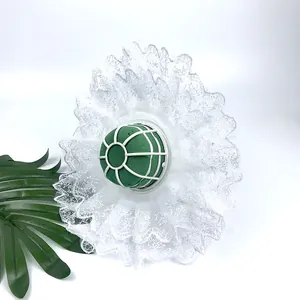 Detailed view of white lace bridal bouquet holder with green floral foam and grid