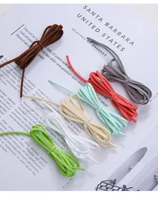 Close-up of colorful double-sided suede cords for DIY handmade crafts and floral packing