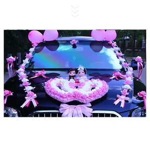 Heart-shaped wedding car decoration set with pink roses and dolls on black hood
