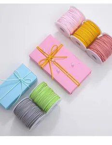 Assorted colorful suede cord ribbon spools for DIY handmade flower gift wrapping crafts